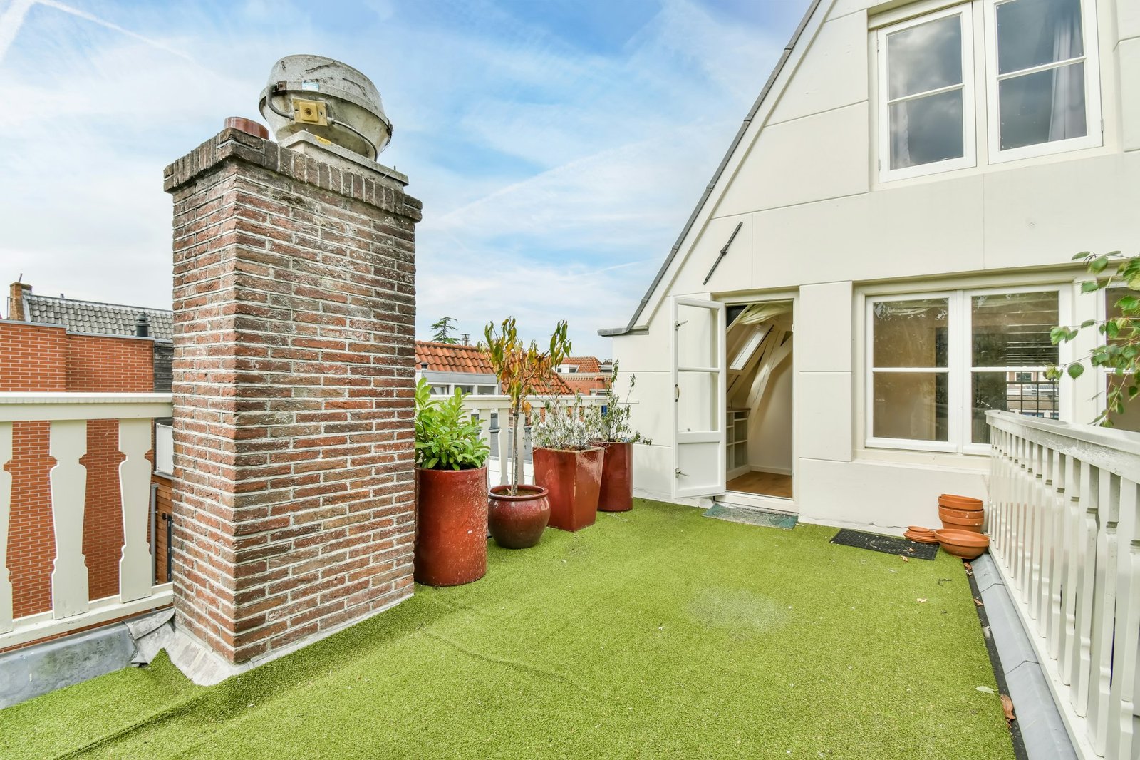 House roof with artificial turf