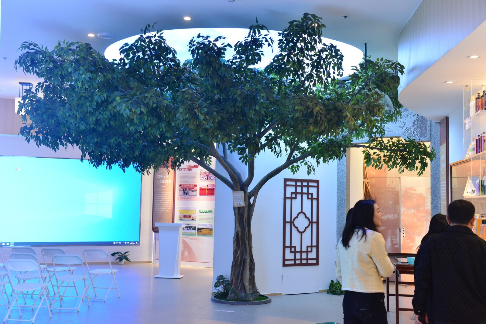 Large custom artificial banyan tree shown for commercial space planning