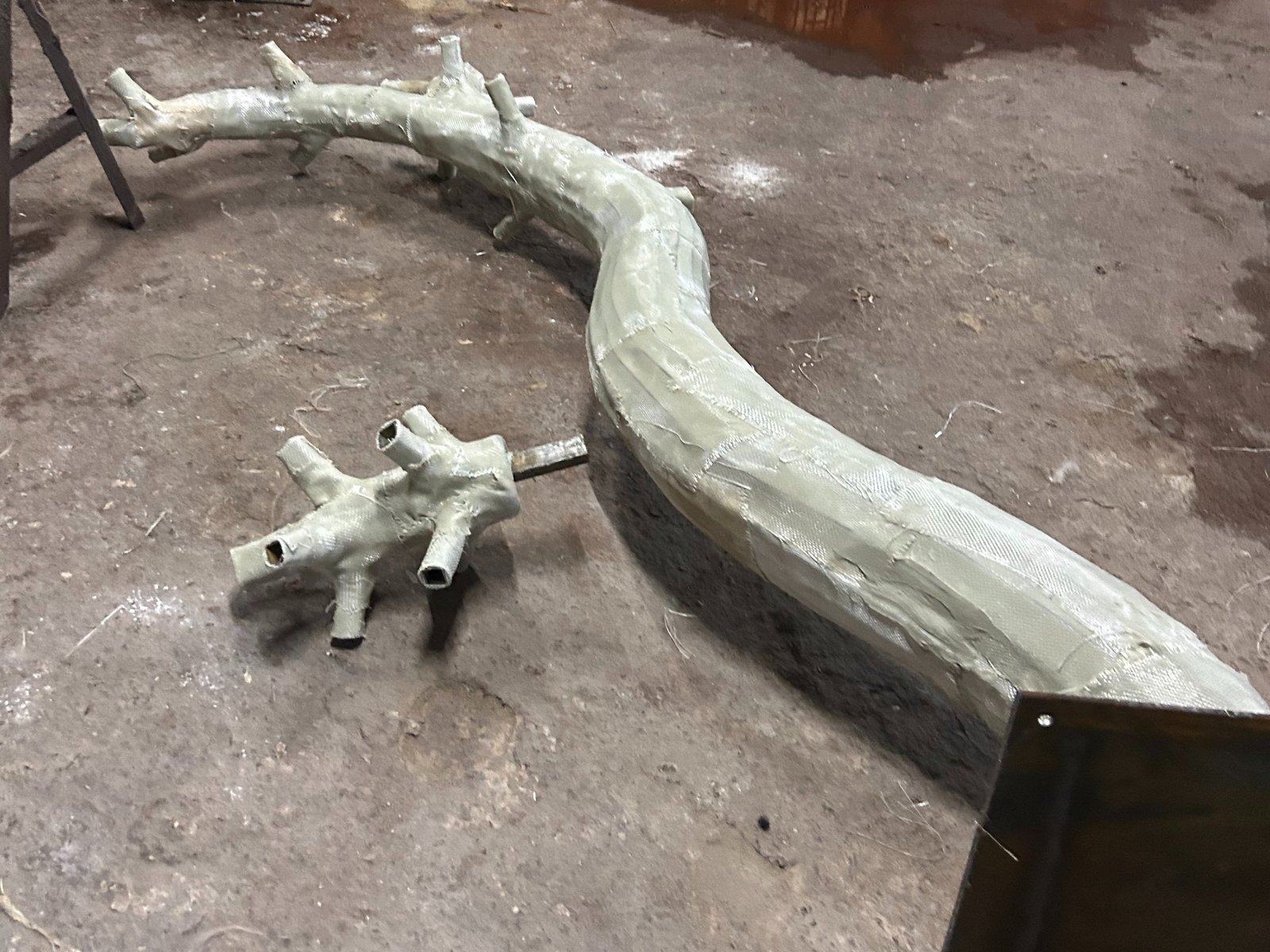 Trunk shaping and surface finishing for a custom artificial bonsai tree
