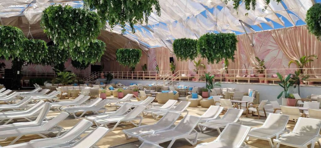 Large-scale custom artificial flower ceiling installation