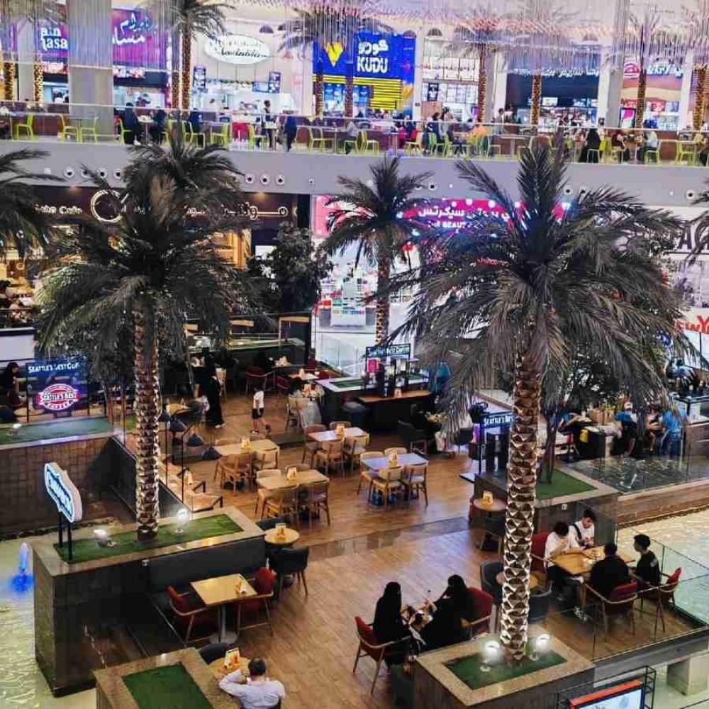 Large artificial palm tree installation for a shopping mall in Riyadh