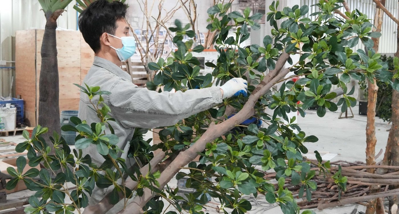 Artificial banyan tree leaf installation and canopy assembly in the workshop