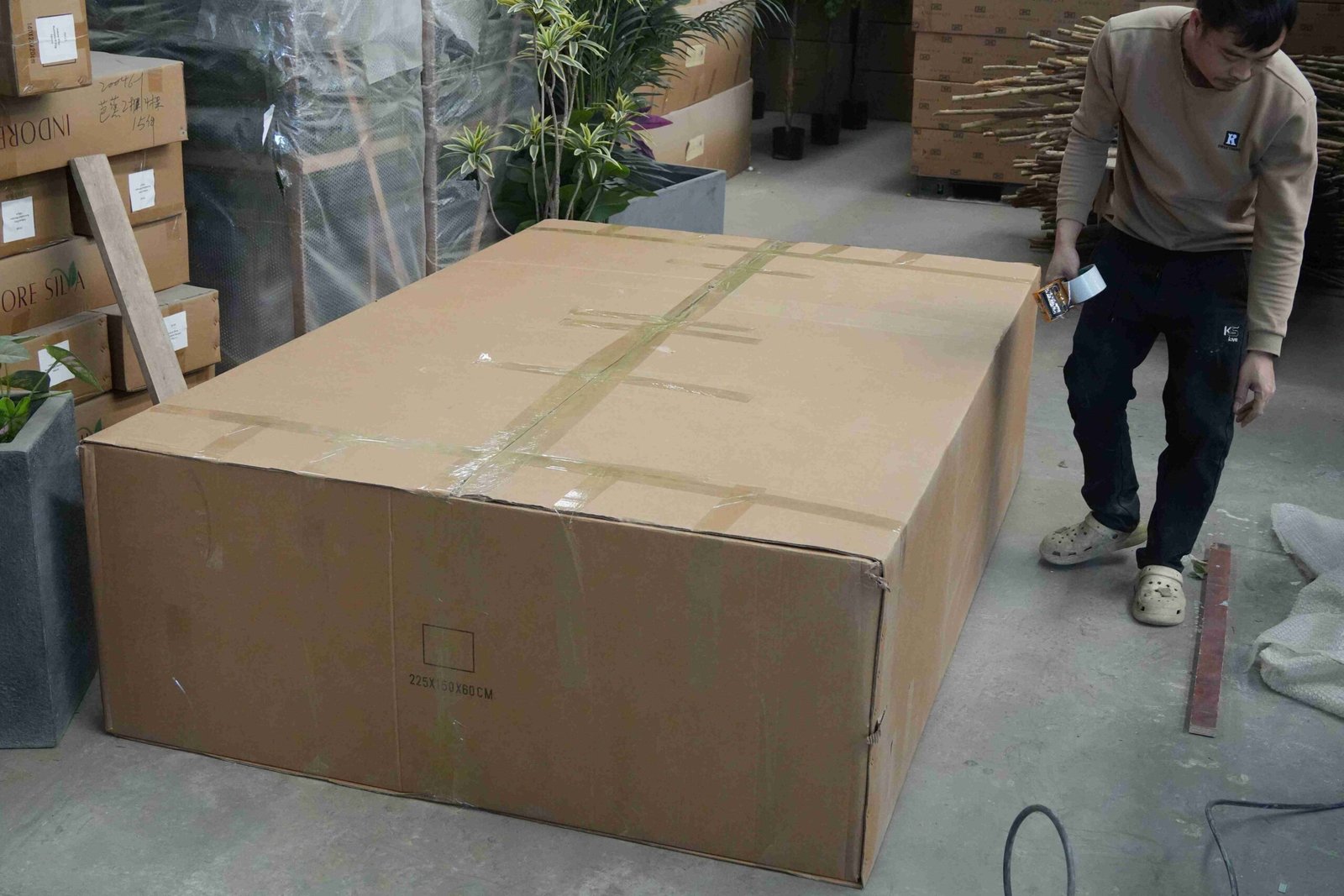 Large artificial olive tree components packed in cartons for export