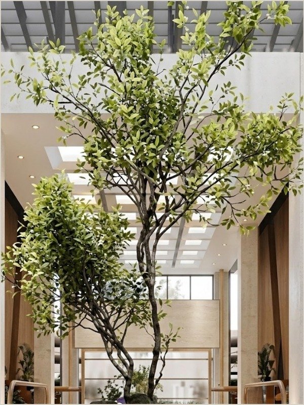 Realistic custom artificial tree for commercial interior landscaping, hotel lobby greenery, mall atrium decoration, and architectural plant projects