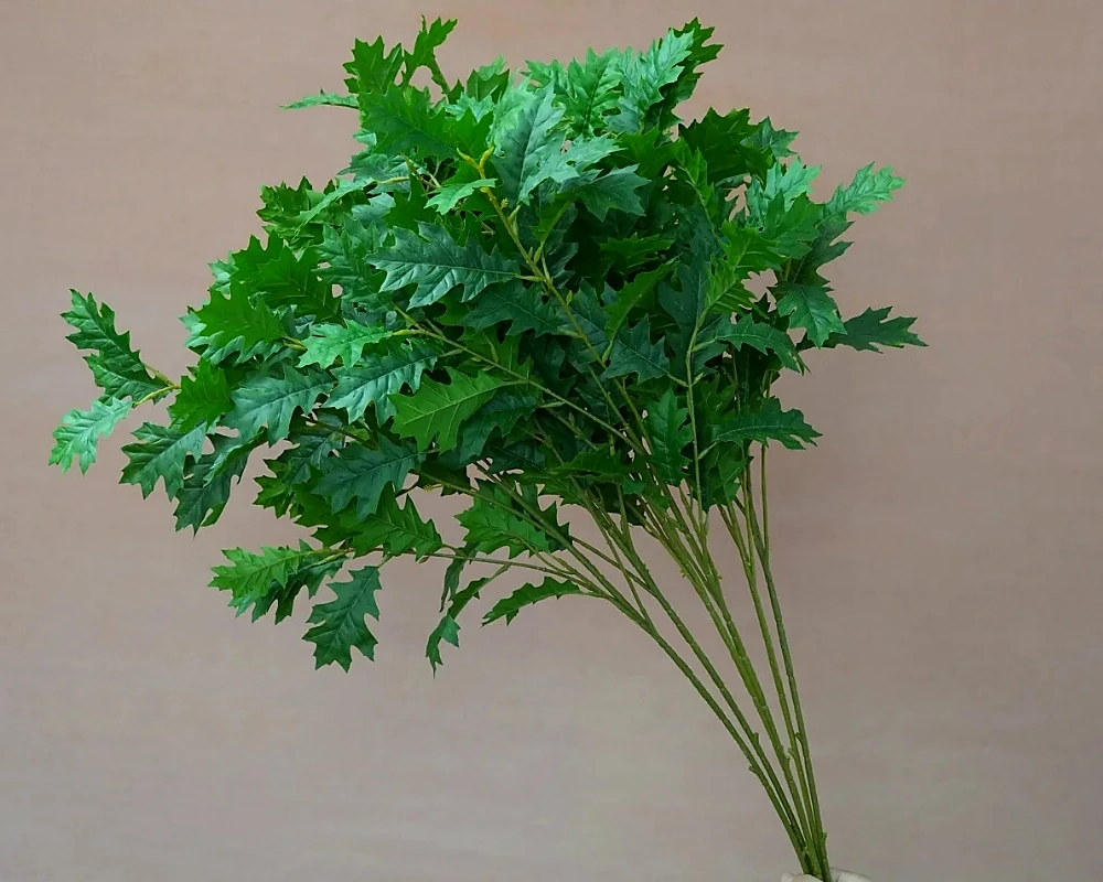 Artificial oak branches with green lobed foliage