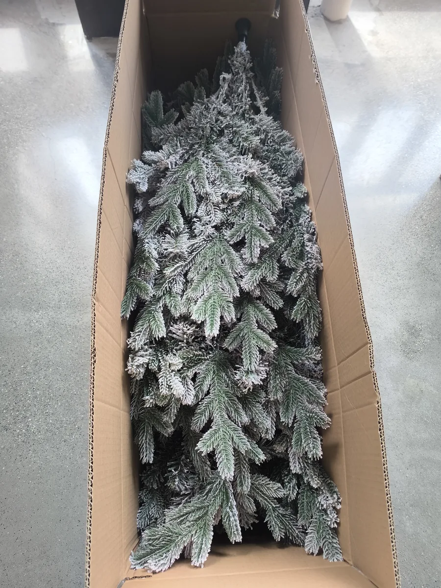 Commercial Christmas tree inside an export carton
