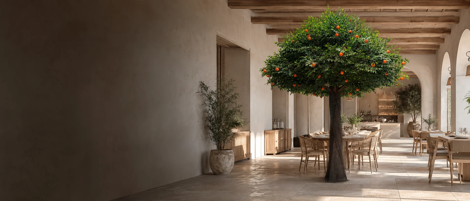 Large artificial orange tree in a Mediterranean-style commercial restaurant interior