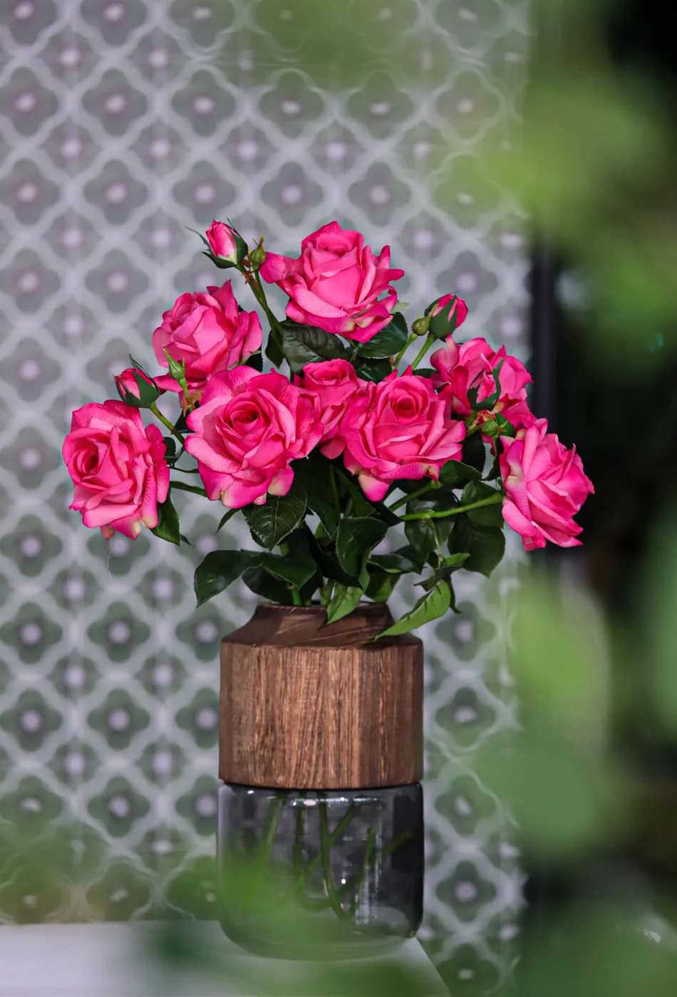 Pink artificial rose arrangement for commercial interior styling