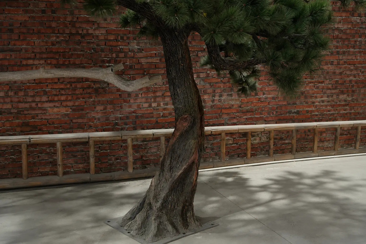 Hand-Finished Artificial Pine Trunk Texture Hand-finished bark texture and colour treatment on an artificial pine tree trunk