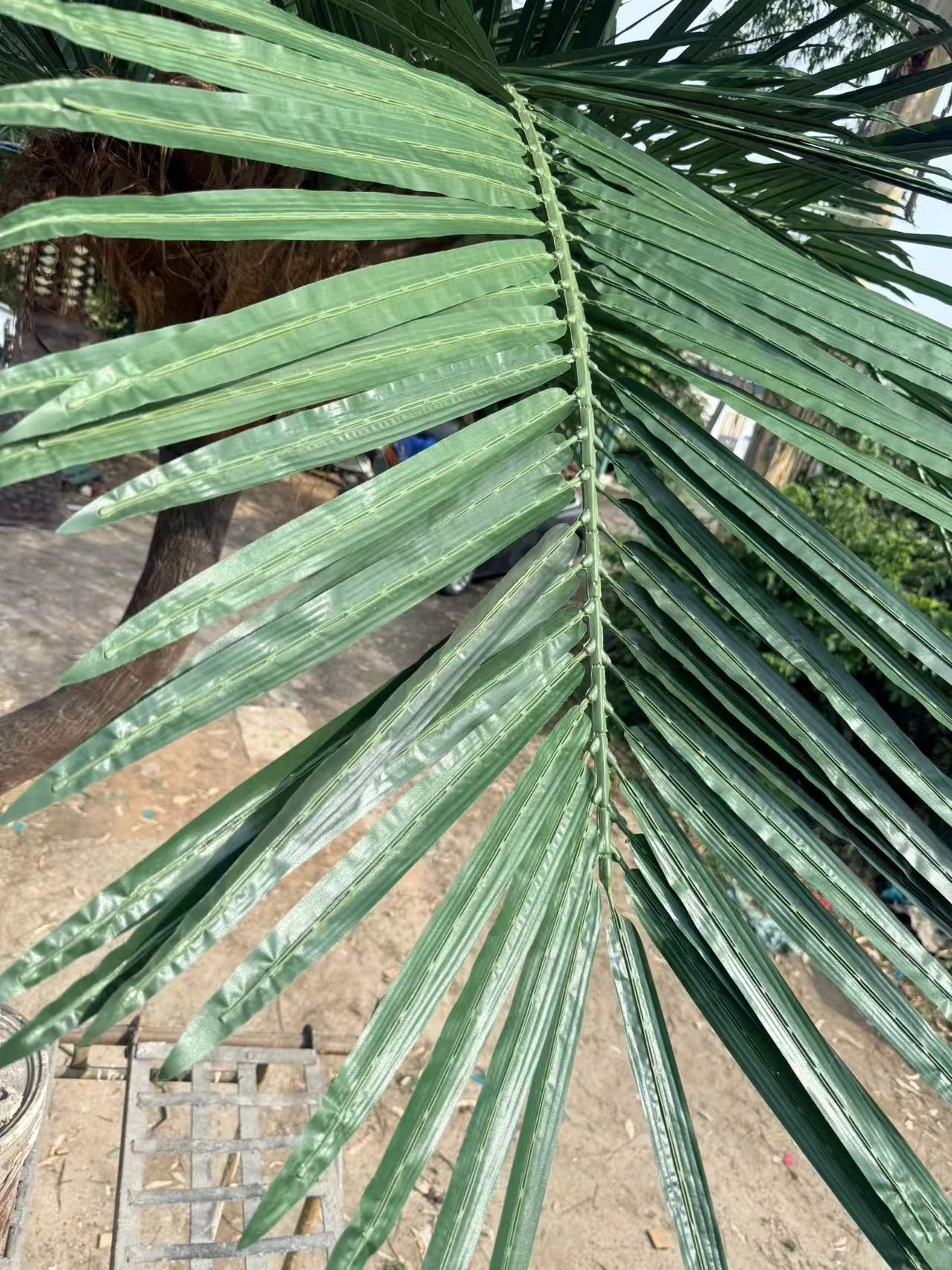 Artificial Palm Frond Detail Close view of artificial palm frond leaf detail
