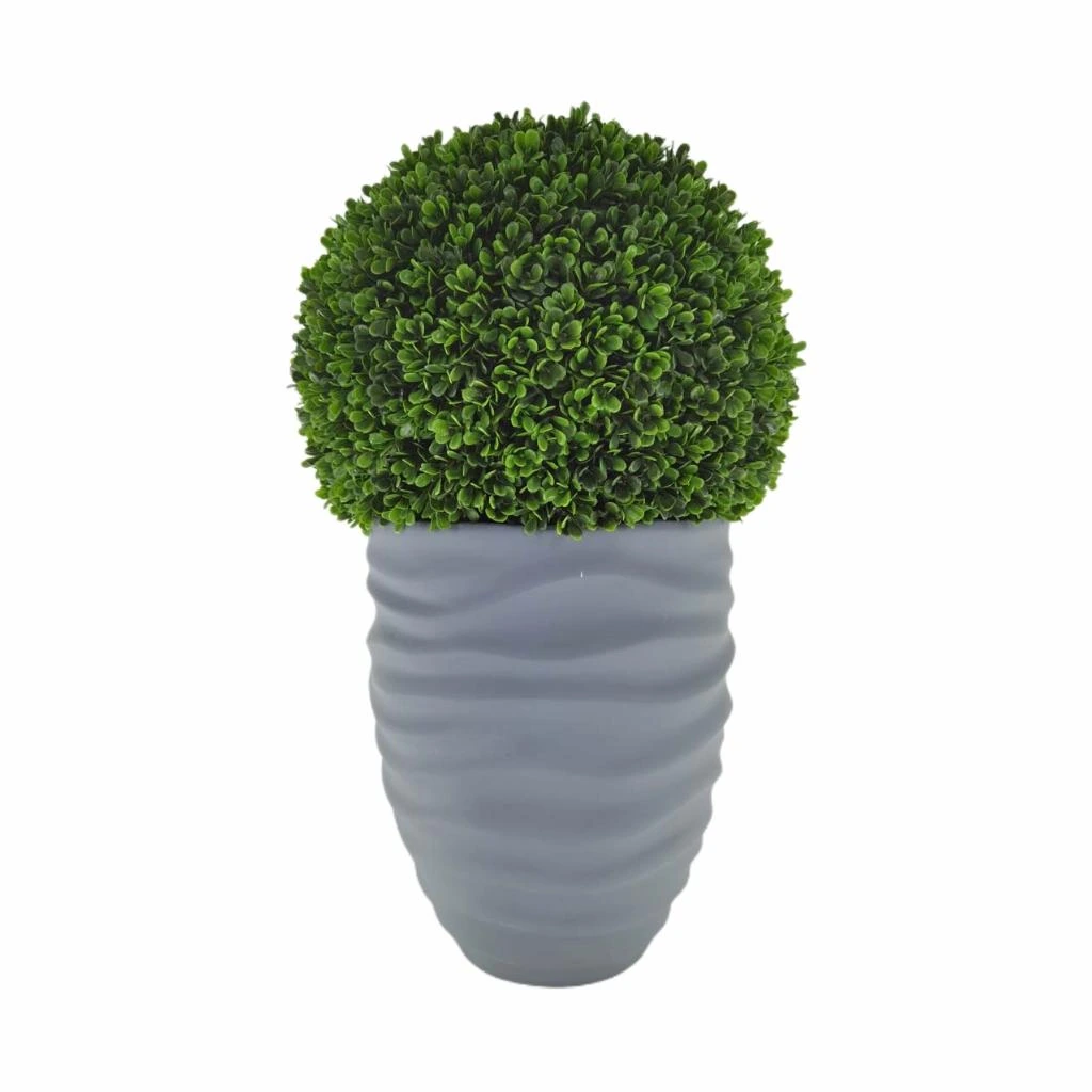 Artificial boxwood ball topiary displayed in a tall ribbed planter