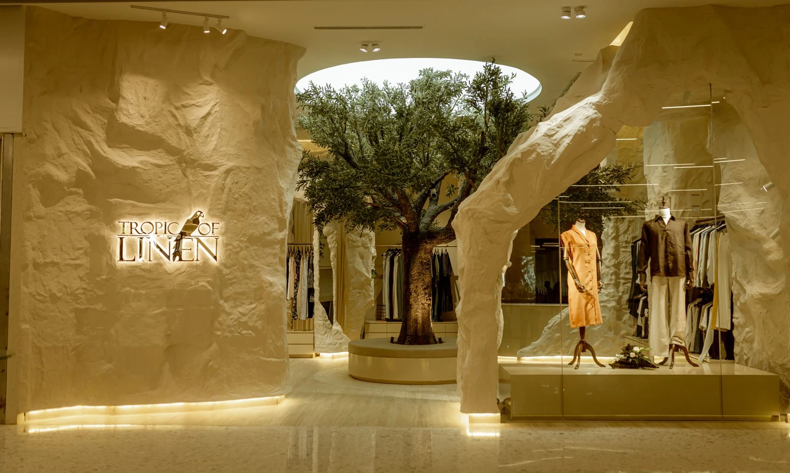Custom artificial olive tree installed in a renovated clothing store in Sri Lanka